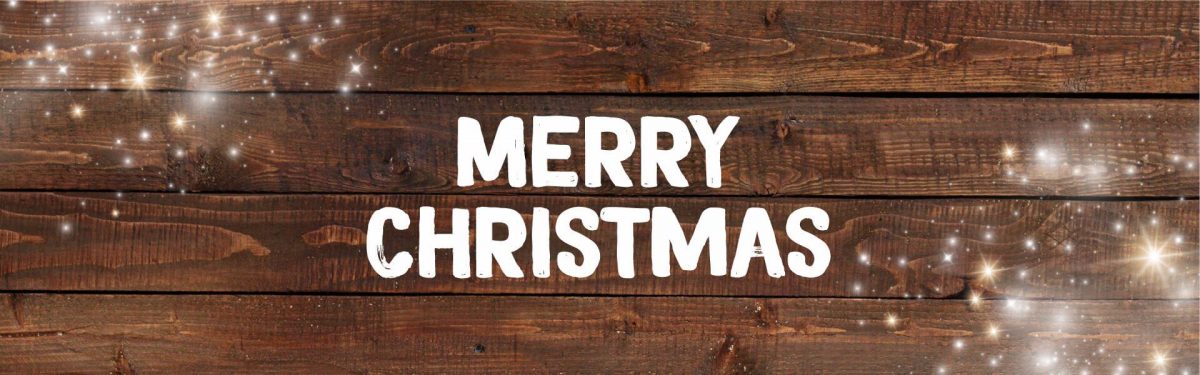 Merry Christmas on a wooden background