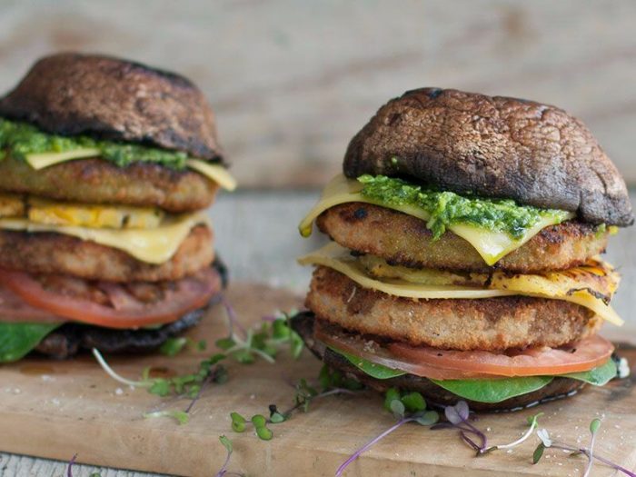 braaied mushroom and fry’s chicken burger with basil, rocket pesto and pineapple